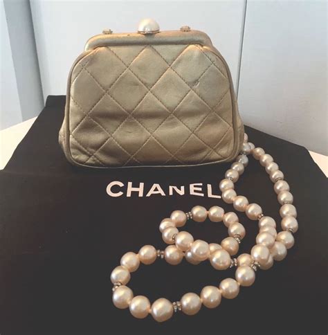 vintage chanel bag gold chain|Chanel bag with pearl chain.